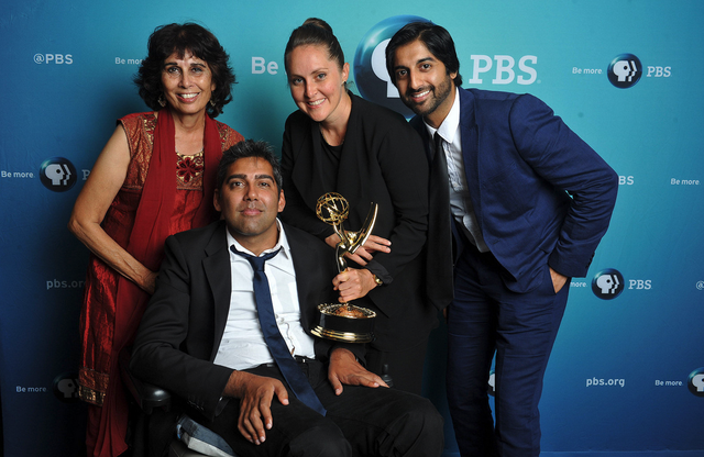 With his team after winning the News & Documentary Emmy Award for When I Walk.